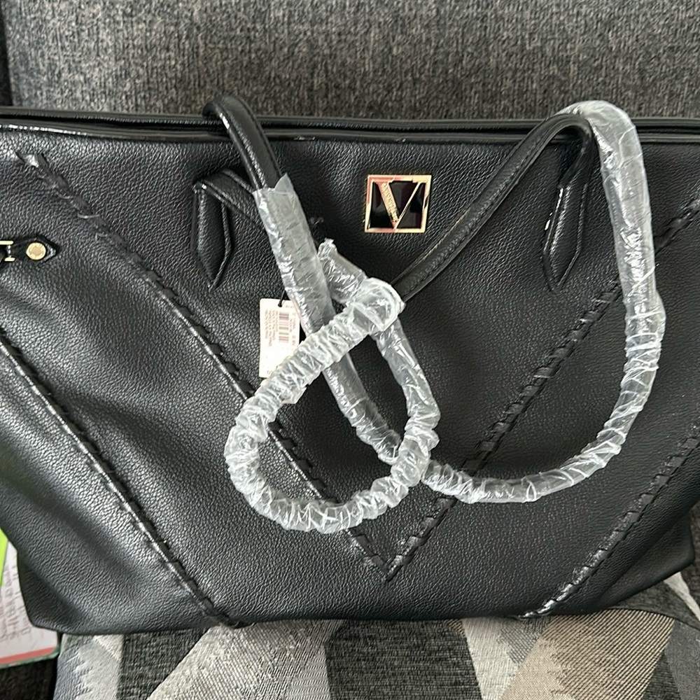 Black ladies tote bag never used